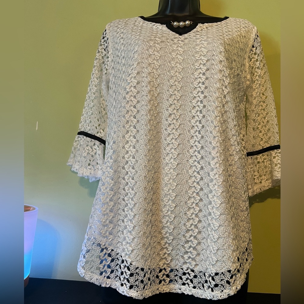 Elegant lacy top.